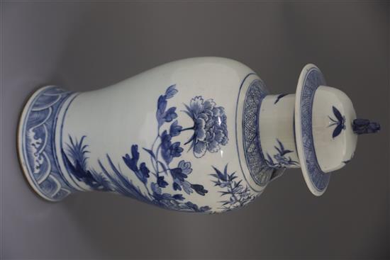 A large Chinese blue and white vase and cover, late 19th century, H.48cm, hardwood stand